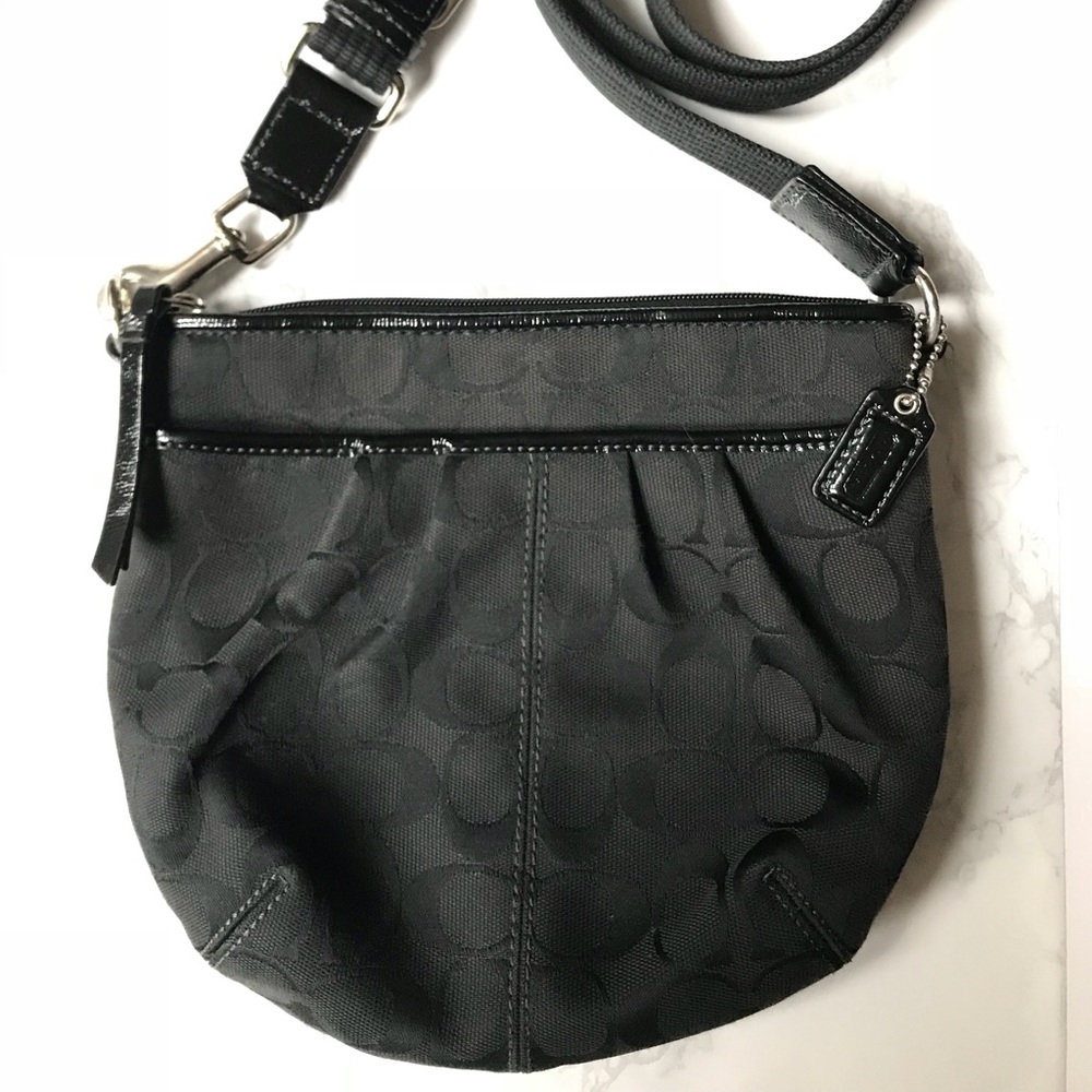 Coach black cross body logo print bag